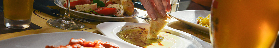 Eating Greek Mediterranean at Cafe Akroteri restaurant in Bellingham, WA.